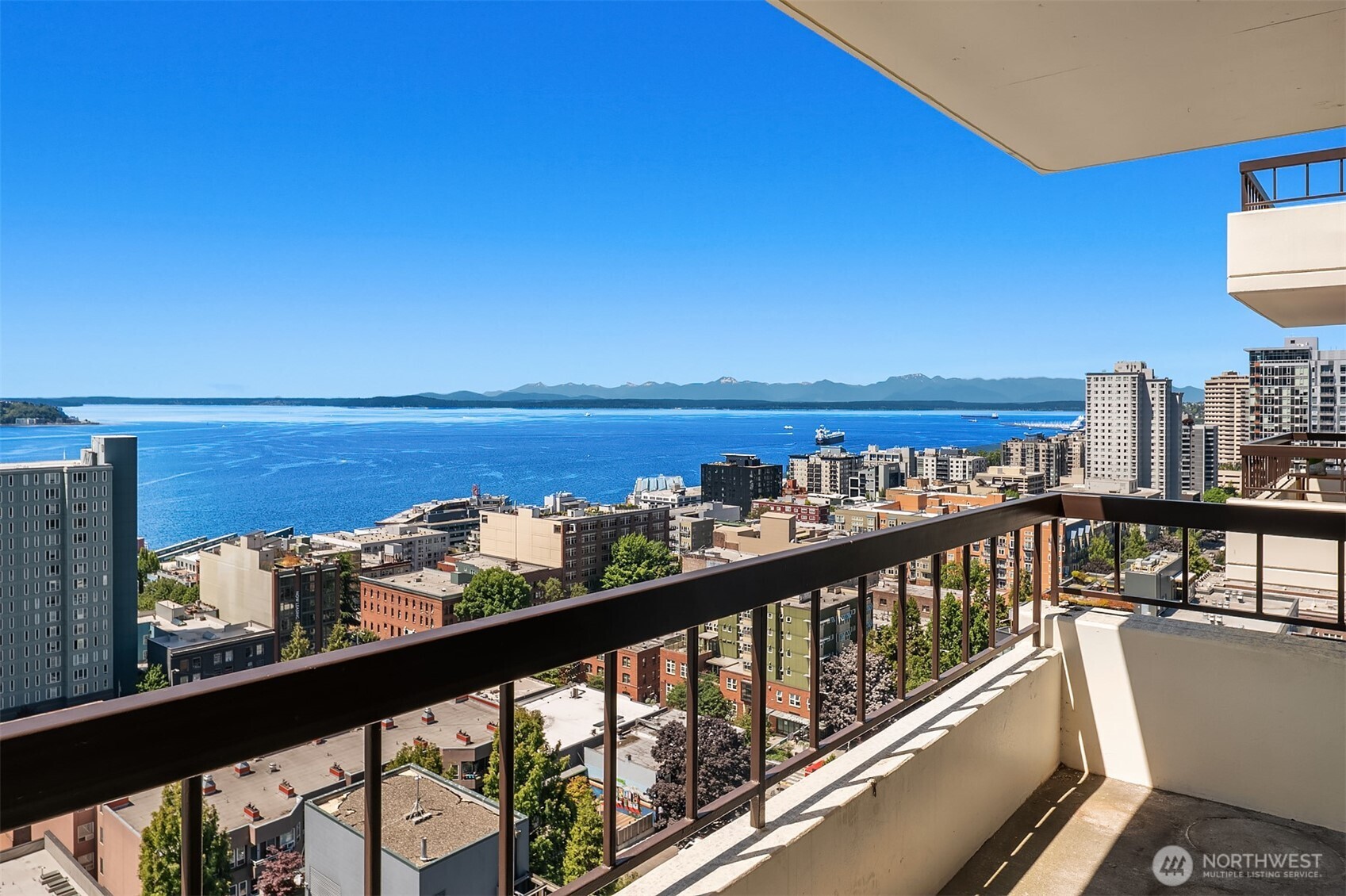 2201 3rd Avenue, Unit 2003 Seattle, WA 98121 - Photo 19 of 38 a view of a balcony with an ocean view