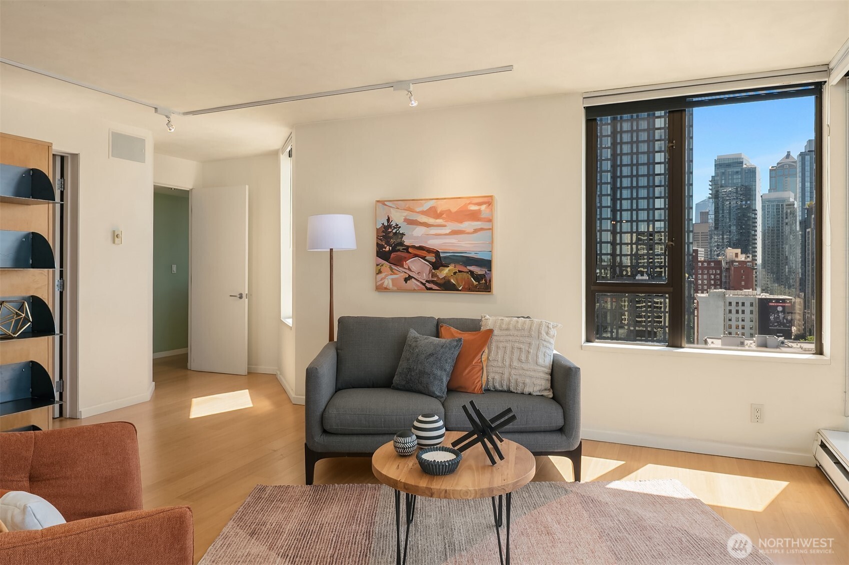 2201 3rd Avenue, Unit 2003 Seattle, WA 98121 - Photo 23 of 38 a living room with furniture and a window