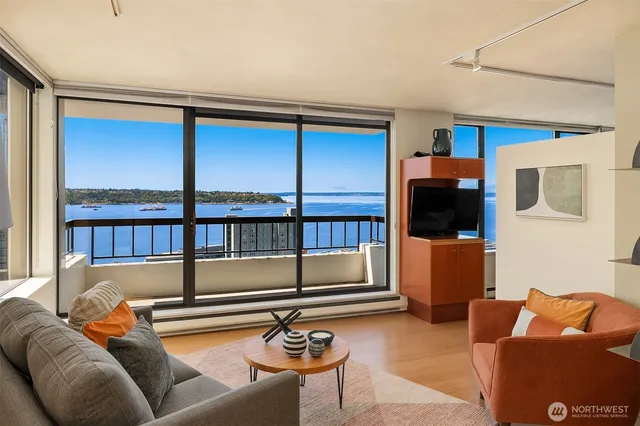 a view of roof deck with furniture