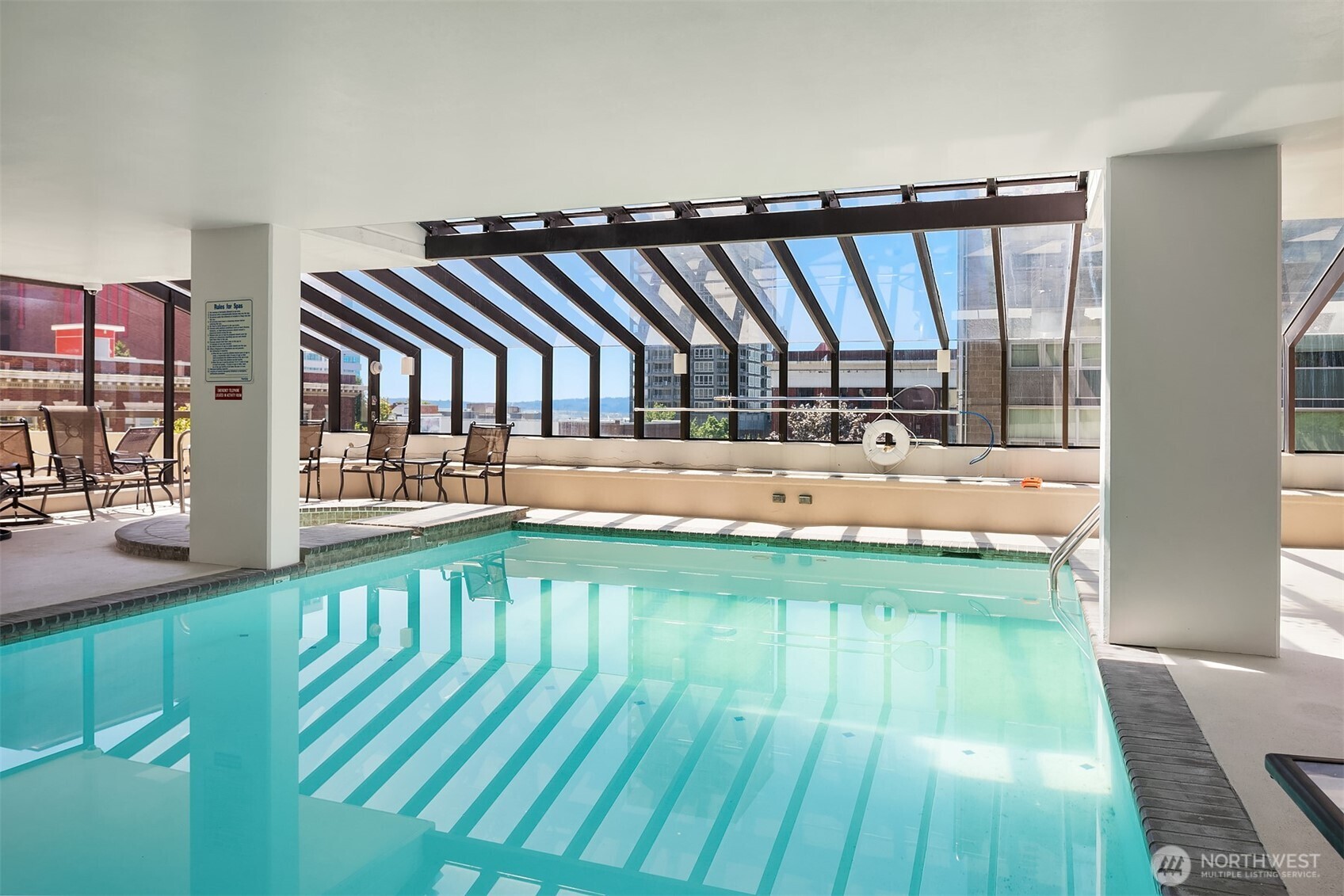 2201 3rd Avenue, Unit 2003 Seattle, WA 98121 - Photo 34 of 38 a view of swimming pool with outdoor seating