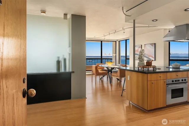 a view of dining table with chairs