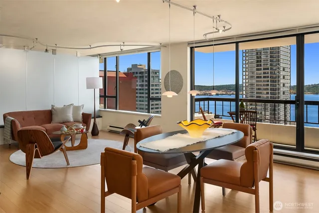 a dining room with furniture and window