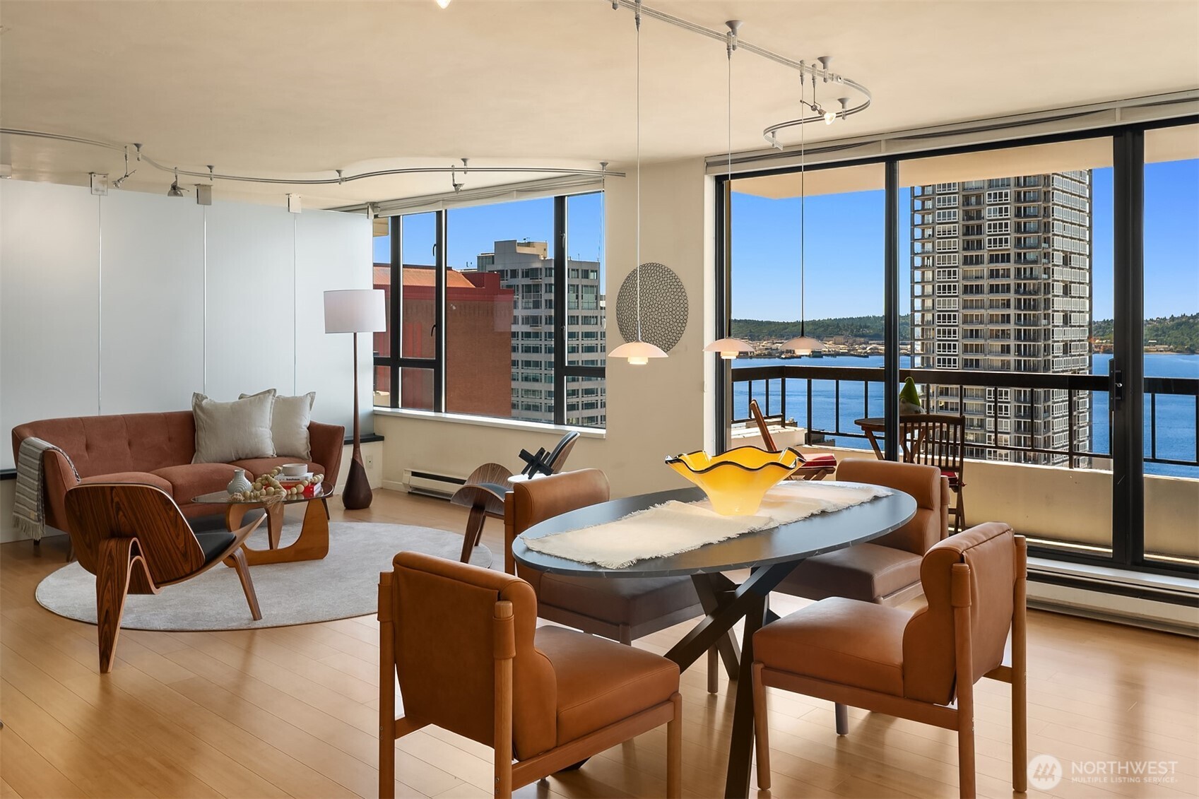 2201 3rd Avenue, Unit 2003 Seattle, WA 98121 - Photo 6 of 38 a dining room with furniture and window
