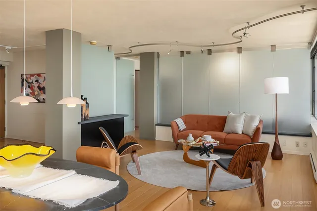 a living room with furniture and a table