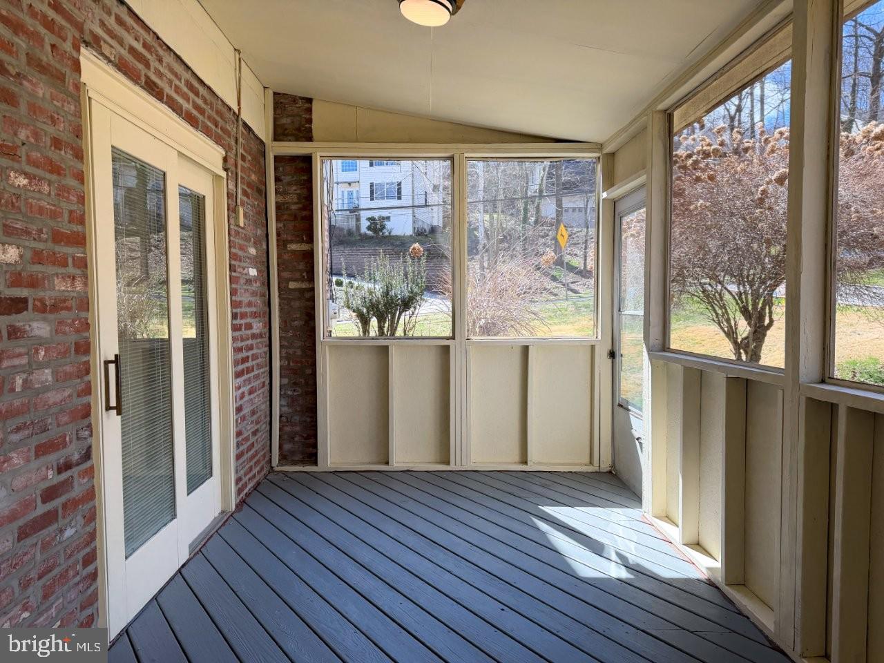 637 North Bishop Avenue Springfield, PA 19064 - Photo 11 of 51 a view of a big room with wooden floor and doors