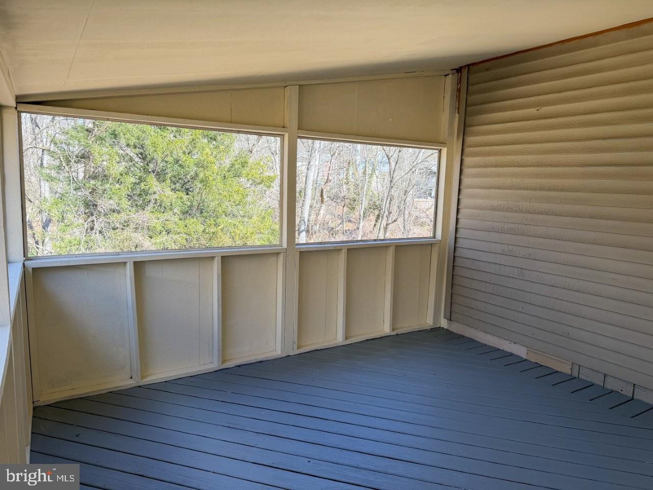 637 North Bishop Avenue Springfield, PA 19064 - Photo 13 of 51 a view of an empty room with wooden floor and a window