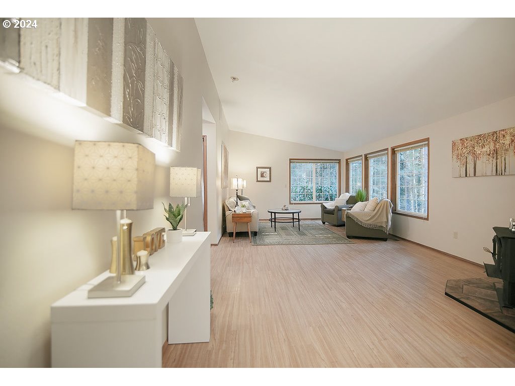59 Whitewater Road Longview, WA 98632 - Photo 3 of 39 a living room with furniture and a wooden floor
