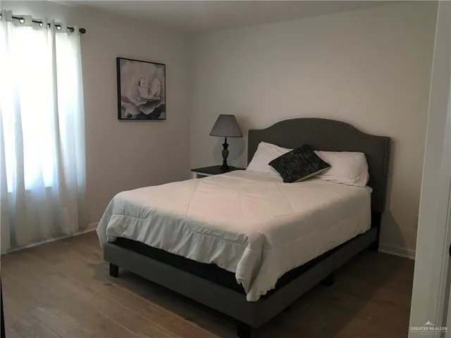 a bathroom with a sink a toilet and tub