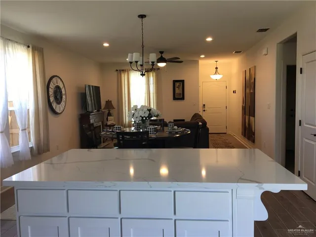 a view of a living room and hallway
