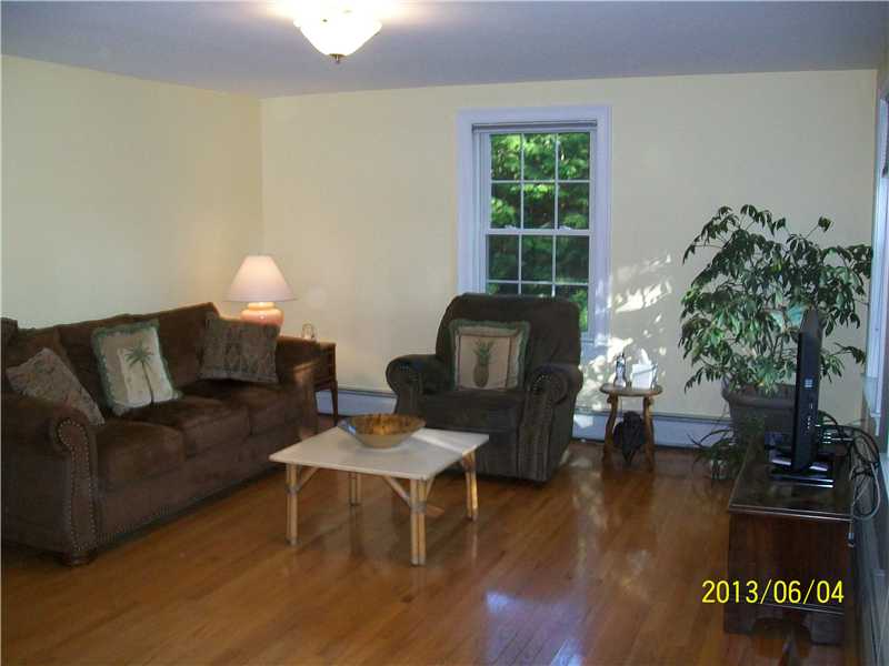 188 Angell Road Lincoln, RI 02865 - Photo 3 of 22 Living Room. Bright and sunny with fresh paint.