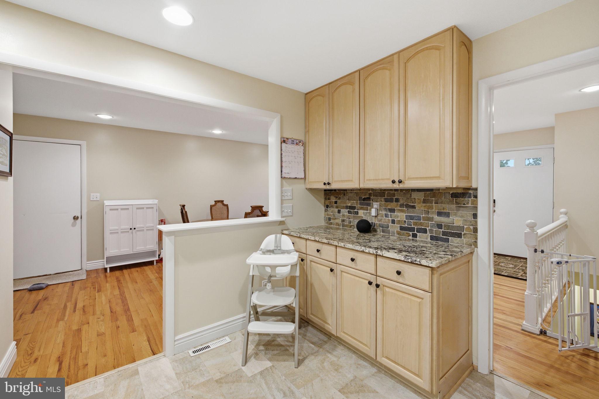 11937 Bayswater Road Gaithersburg, MD 20878 - Photo 14 of 55 Charming kitchen with elegant finishes.