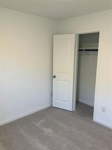 an empty room with closet
