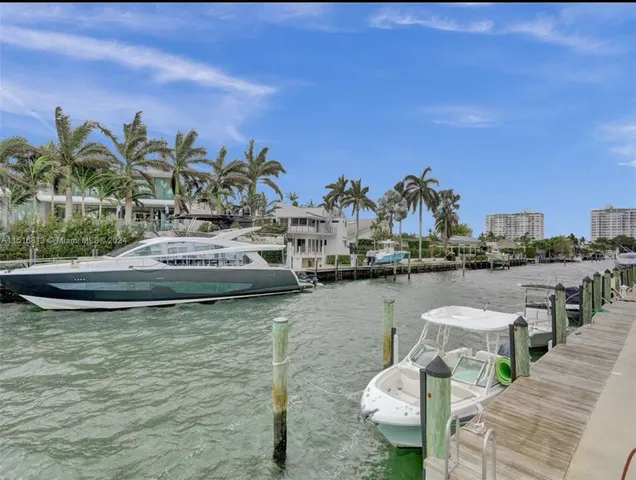 a view of a lake with sitting area
