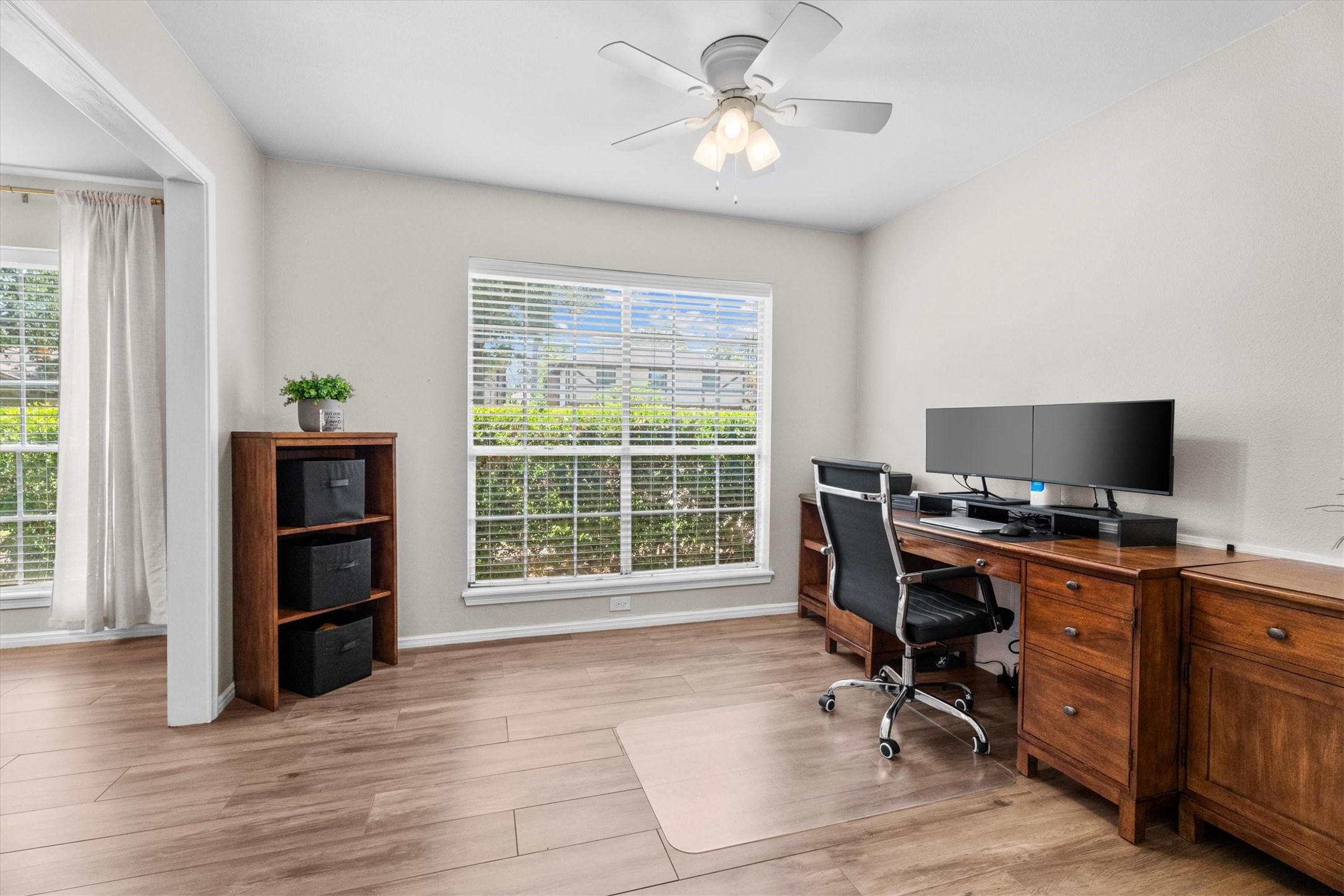 4026 Oxhill Road Spring, TX 77388 - Photo 10 of 40 Just beyond the dining room, a versatile flex space offers endless possibilities as a home office, study, playroom, or craft room. Its convenient location provides privacy while remaining connected to the heart of the home.