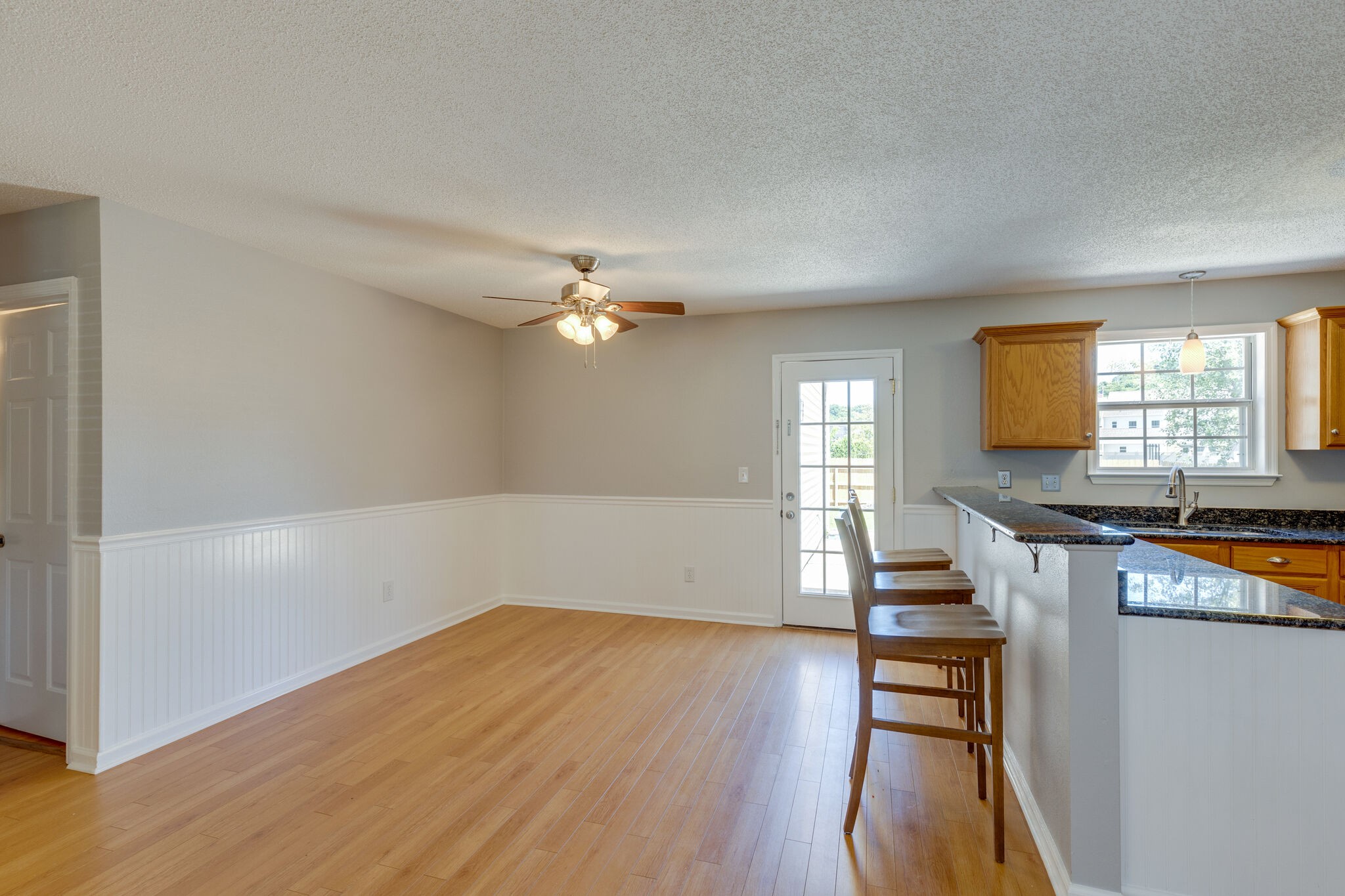 2106 Spring Hill Circle Spring Hill, TN 37174 - Photo 7 of 38 an empty room with wooden floor and windows