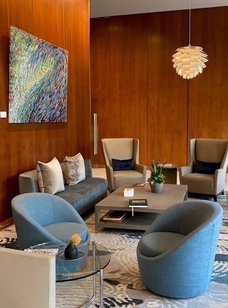 65 East India Row, Unit 33A Boston, MA 02110 - Photo 30 of 36 a living room with furniture and a lamp