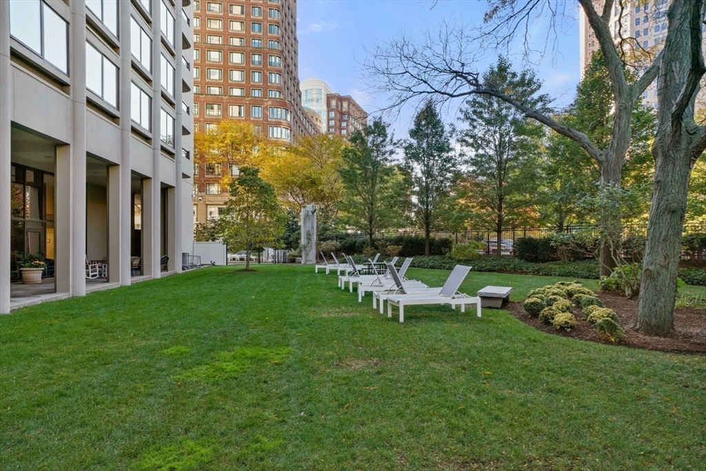 65 East India Row, Unit 33A Boston, MA 02110 - Photo 34 of 36 a view of a park with bench and garden