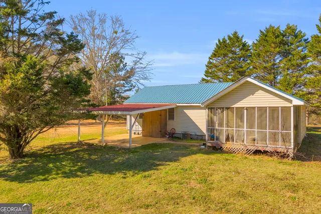 a balcony with trees in front of it