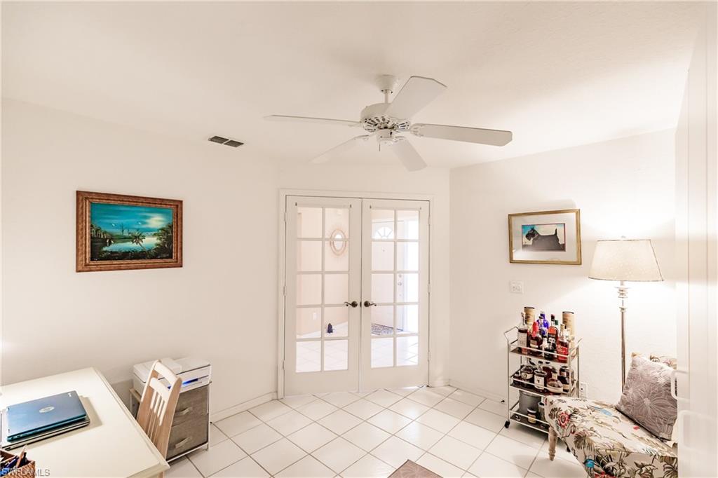 320 Gabriel Circle, Unit 3608 Naples, FL 34104 - Photo 16 of 32 a view of a livingroom with window