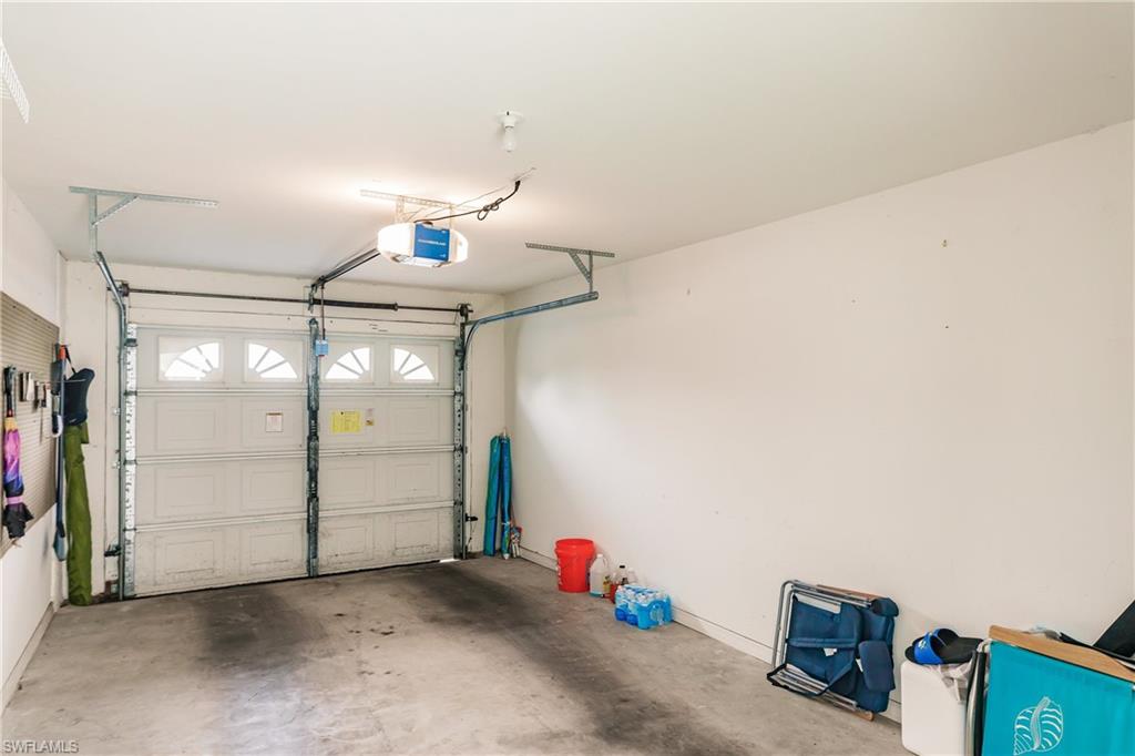 320 Gabriel Circle, Unit 3608 Naples, FL 34104 - Photo 22 of 32 a view of storage and utility room with a window