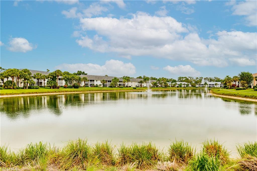 320 Gabriel Circle, Unit 3608 Naples, FL 34104 - Photo 31 of 32 a view of a city and lake