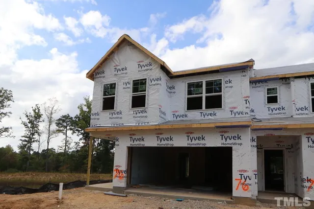 a view of building with refrigerator