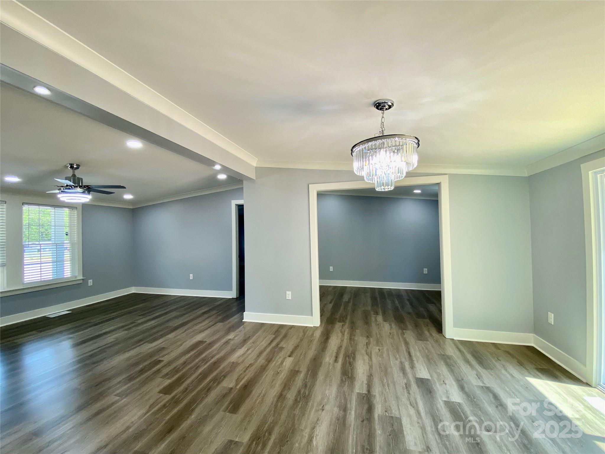 109 Bee Tree Lane Salisbury, NC 28144 - Photo 16 of 39 wooden floor in an empty room with a window