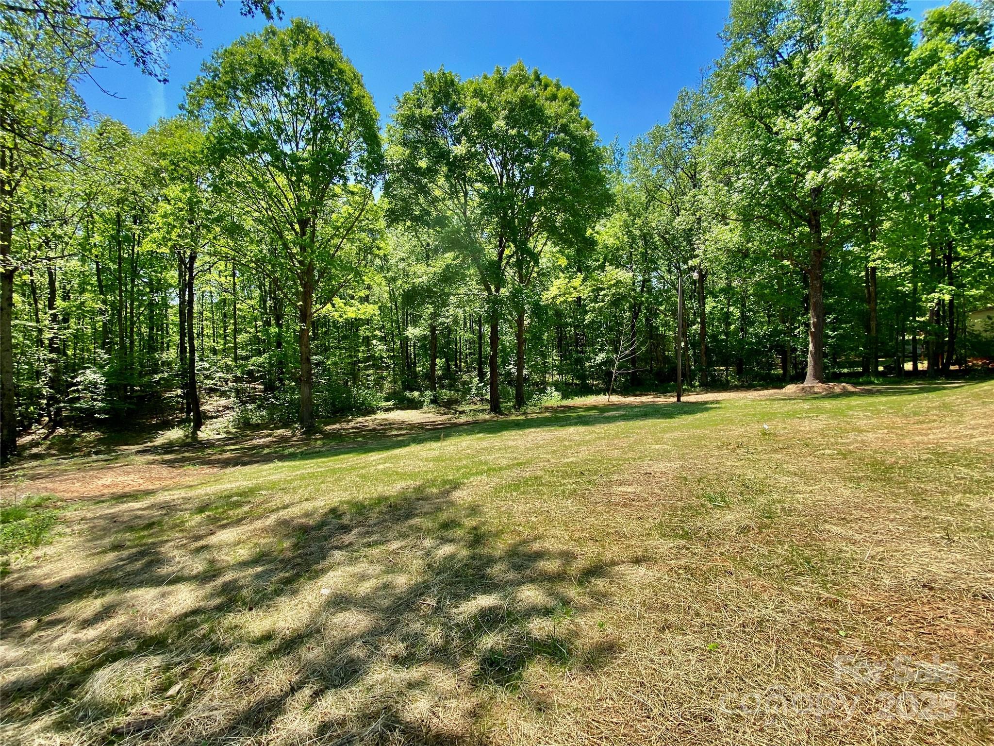 109 Bee Tree Lane Salisbury, NC 28144 - Photo 39 of 39 a swimming pool with trees in the background