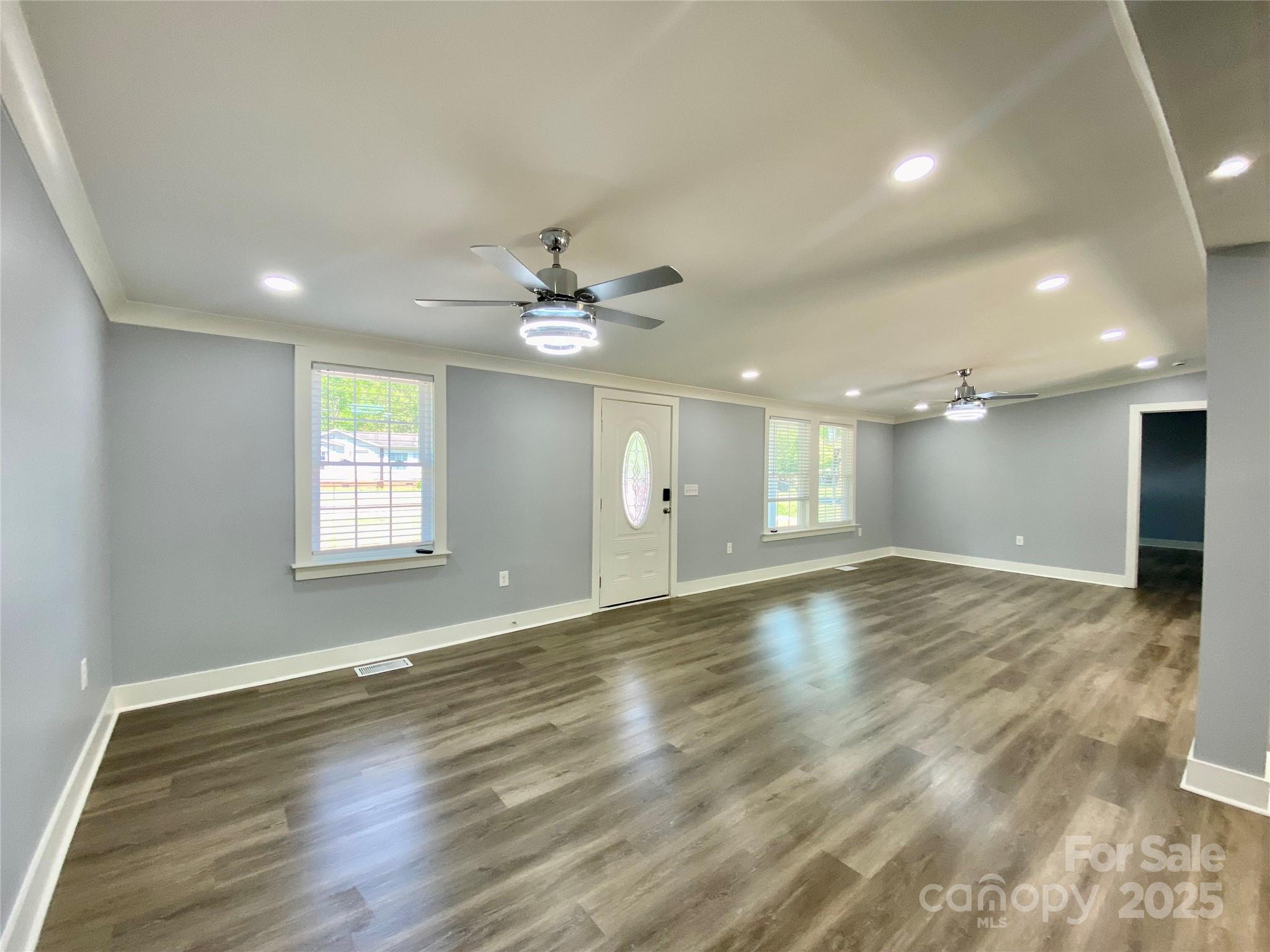 109 Bee Tree Lane Salisbury, NC 28144 - Photo 9 of 39 an empty room with wooden floor and window