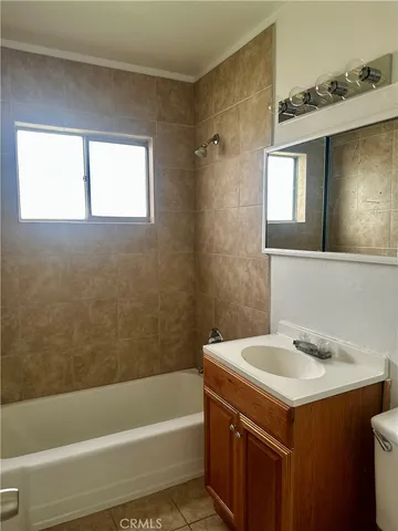 a bathroom with a sink and a bathtub