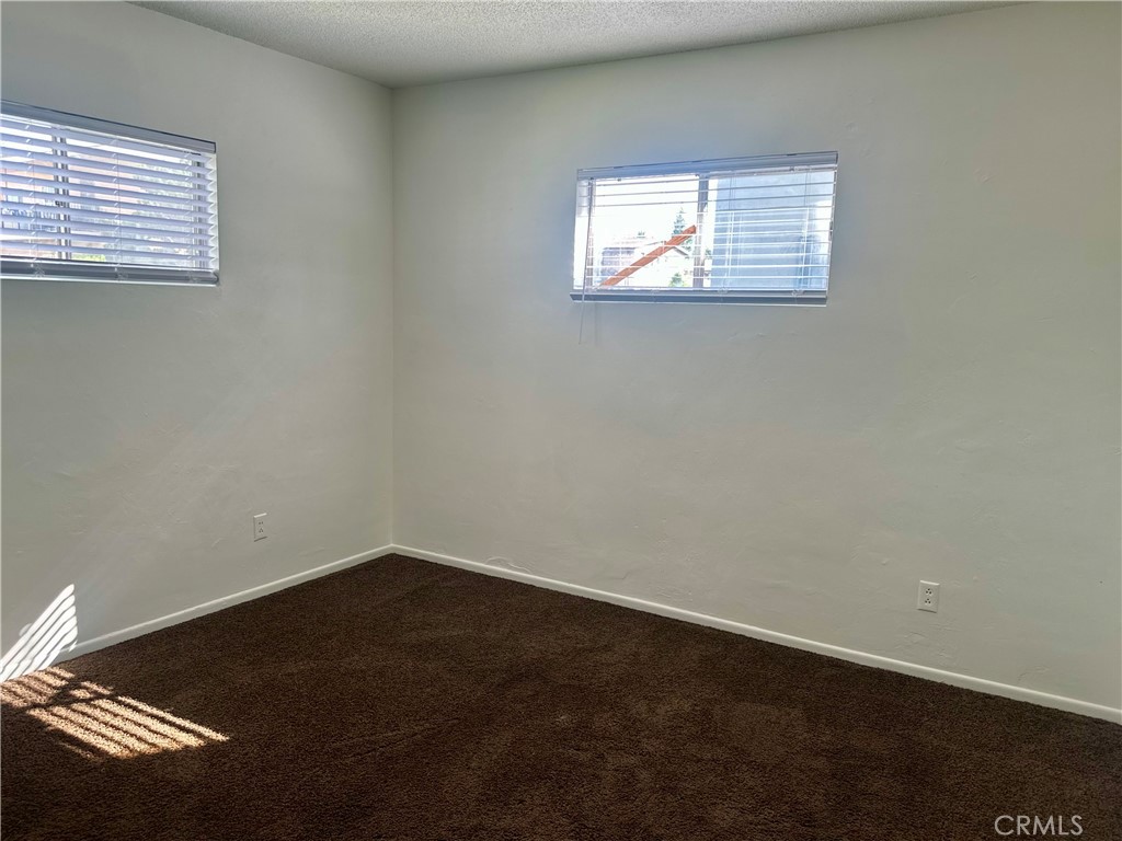 5147 Canoga Street, Unit A Montclair, CA 91763 - Photo 9 of 10 an empty room with a window