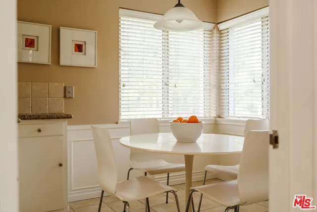 a white bath tub sitting in a bathroom