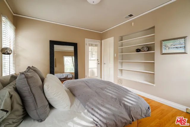 a view of a room that has a window in it