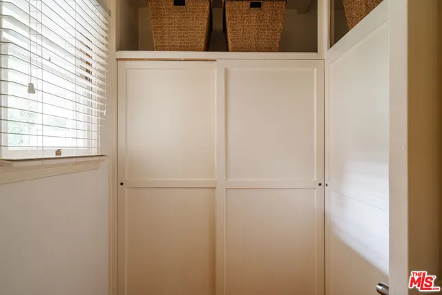 a room with furniture and a flat screen tv