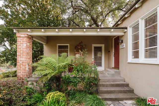 front view of a house with a small yard