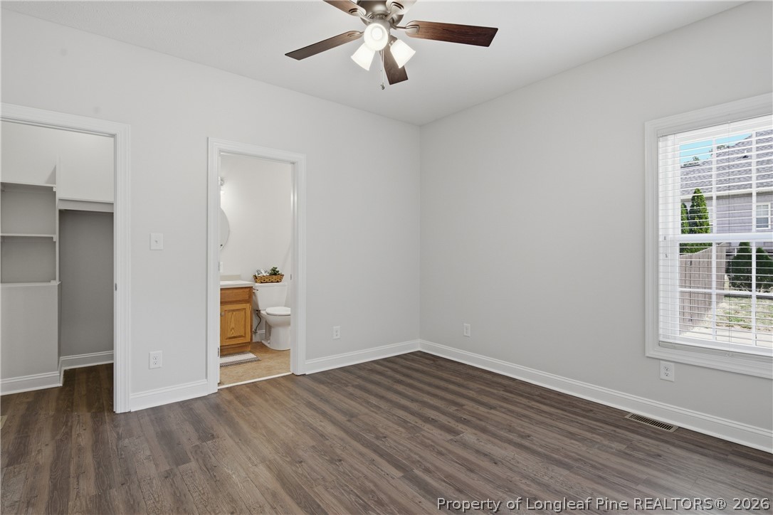 152 Ham Road Hope Mills, NC 28348 - Photo 22 of 50 a view of empty room with wooden floor and ceiling fan