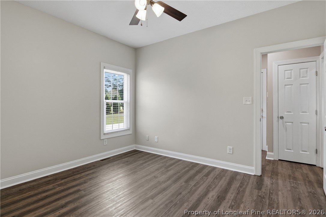 152 Ham Road Hope Mills, NC 28348 - Photo 23 of 50 wooden floor in an empty room with a window