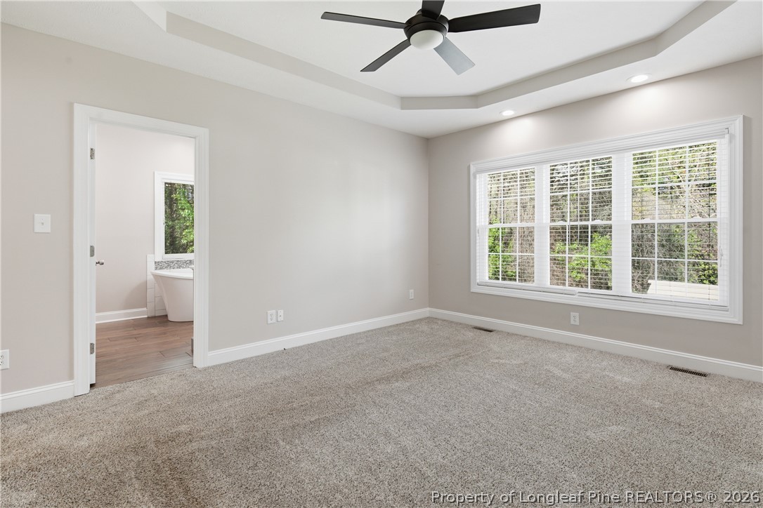 152 Ham Road Hope Mills, NC 28348 - Photo 27 of 50 a view of a livingroom with a ceiling fan and window