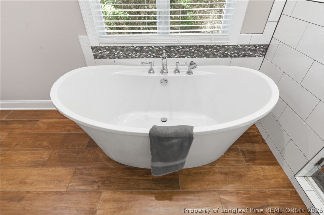152 Ham Road Hope Mills, NC 28348 - Photo 34 of 50 a view of bathtub in wooden floor