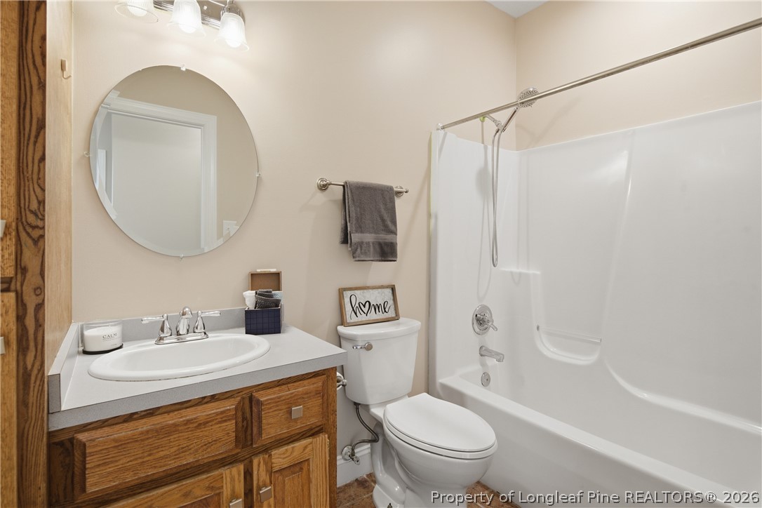 152 Ham Road Hope Mills, NC 28348 - Photo 39 of 50 a bathroom with a sink toilet and shower