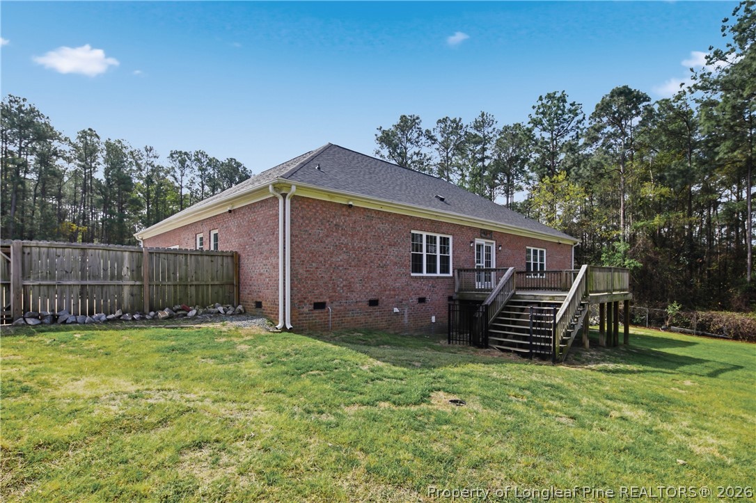 152 Ham Road Hope Mills, NC 28348 - Photo 44 of 50 a backyard of a house with lots of green space