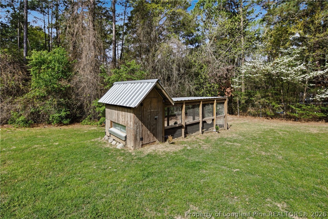 152 Ham Road Hope Mills, NC 28348 - Photo 49 of 50 a view of a house with backyard