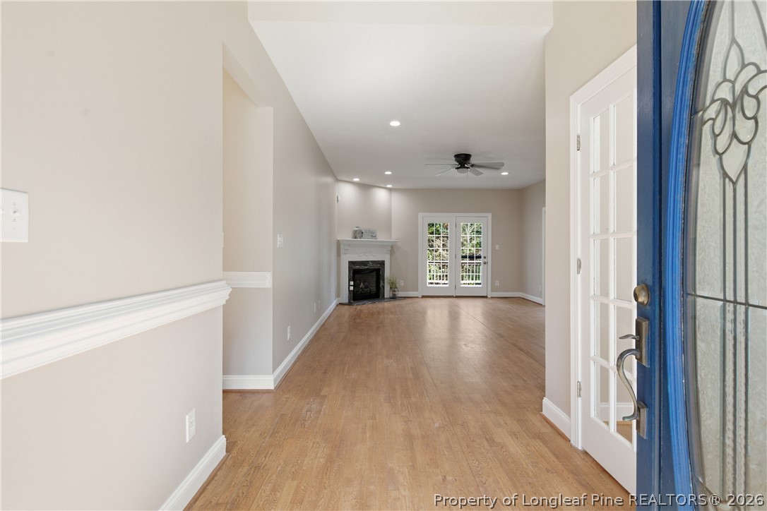152 Ham Road Hope Mills, NC 28348 - Photo 5 of 50 a view of an empty room with a fireplace and a window