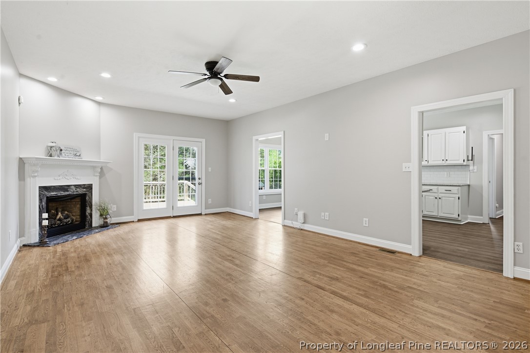 152 Ham Road Hope Mills, NC 28348 - Photo 6 of 50 a view of an empty room with a window and a fireplace