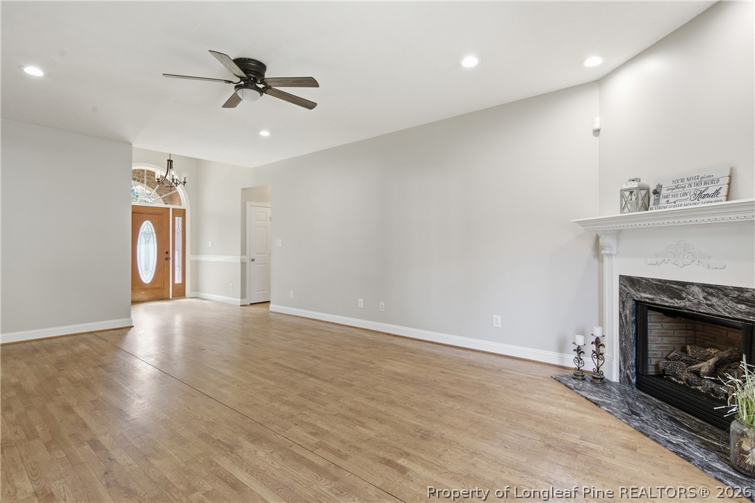 152 Ham Road Hope Mills, NC 28348 - Photo 8 of 50 a view of an empty room with a fireplace and a window