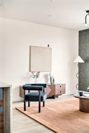 a living room with furniture and a table