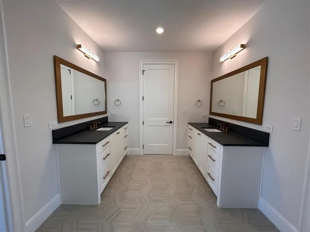 a bathroom with a toilet a sink and a bathtub