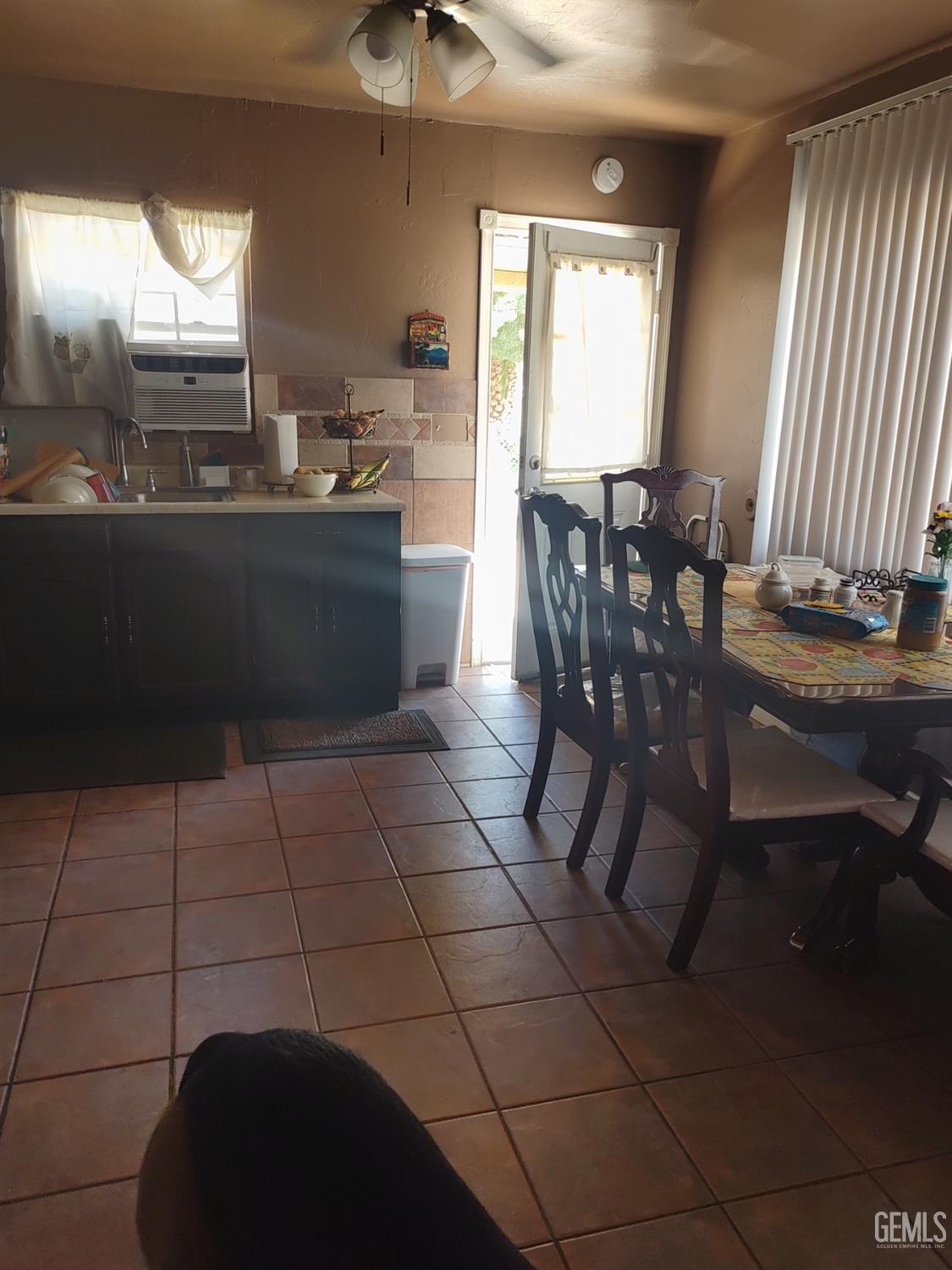 Undisclosed Address Bakersfield, CA 93307 - Photo 5 of 7 a kitchen with a sink a counter top space and appliances