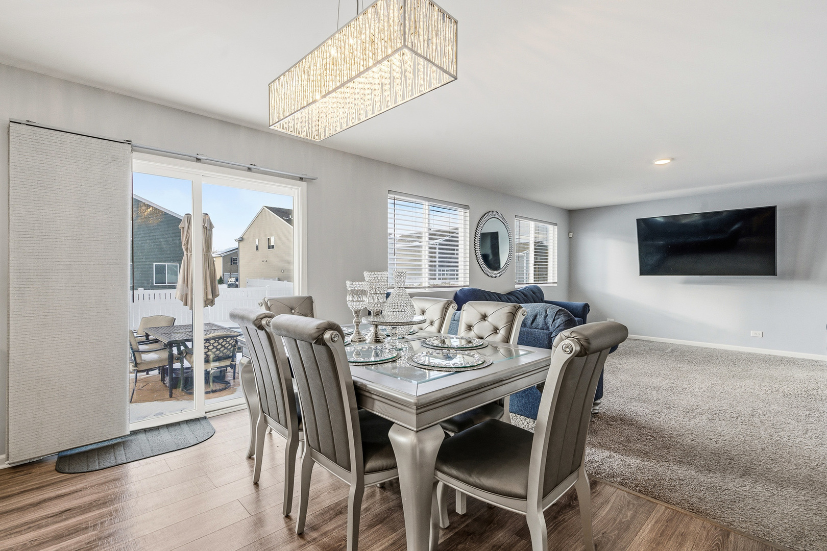 434 Stonebrook Drive Romeoville, IL 60446 - Photo 13 of 38 a view of a dining room with furniture and wooden floor