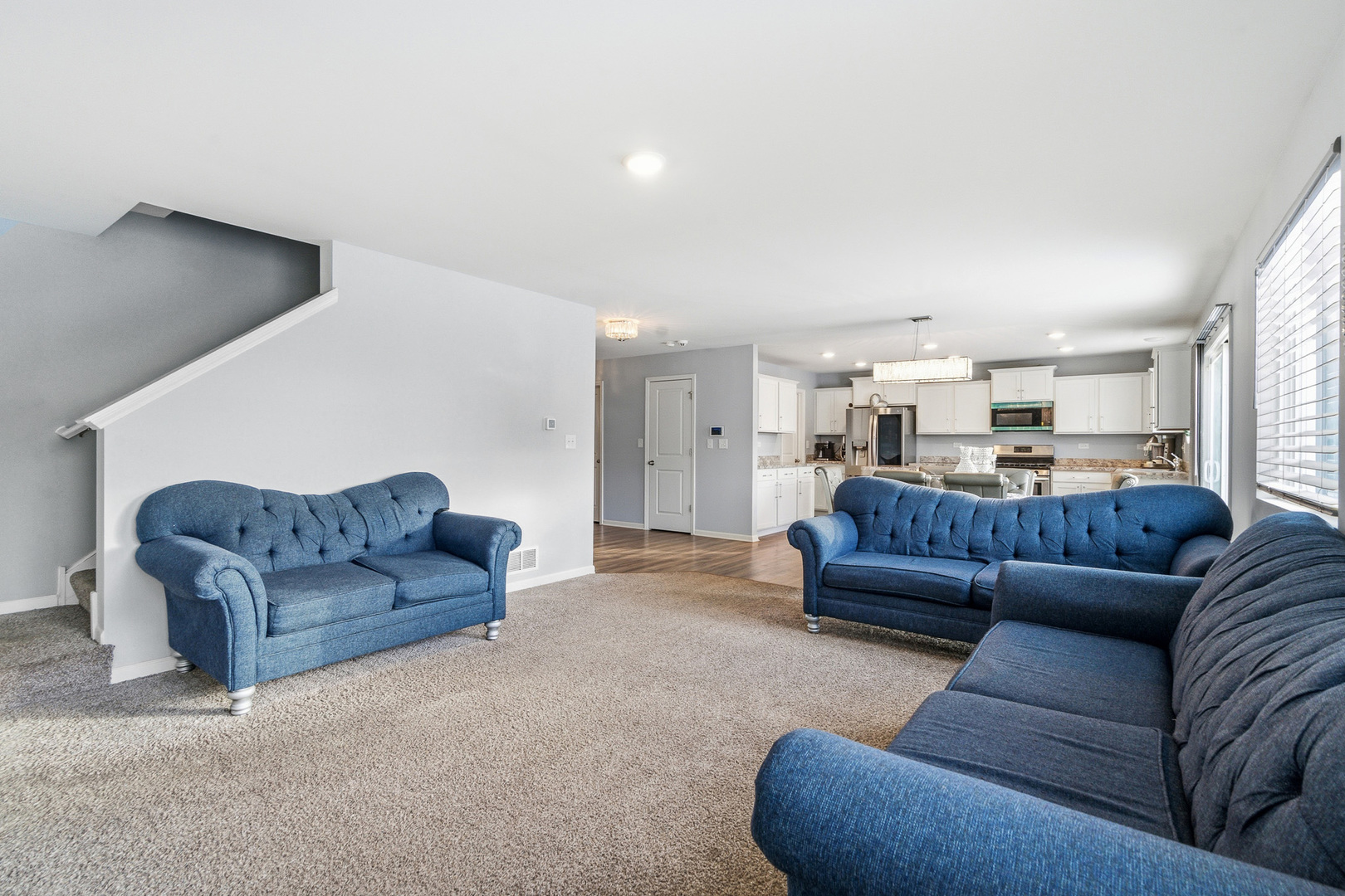 434 Stonebrook Drive Romeoville, IL 60446 - Photo 16 of 38 a living room with furniture and a couch